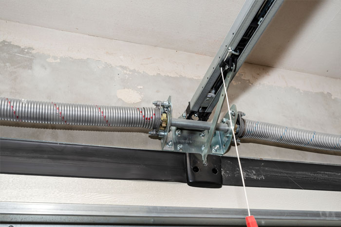 Garage door torsion spring repair service in Toronto