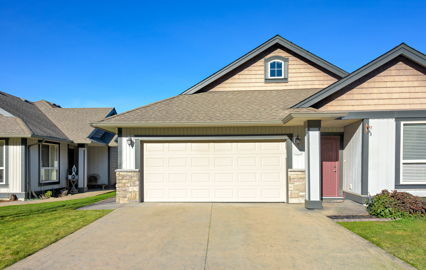 Modern double garage door on Canadian home
