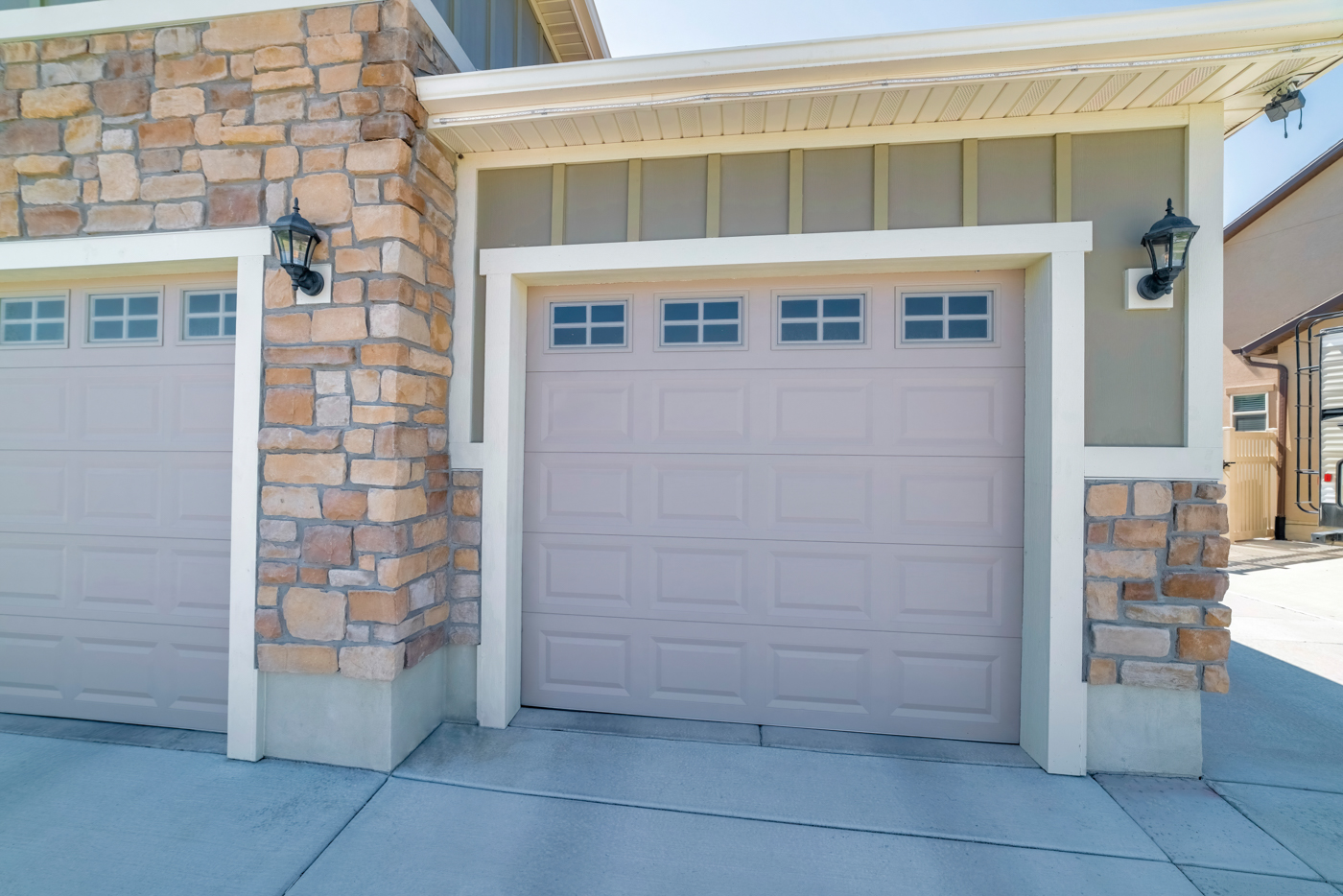 Modern replacement garage door on Canadian home