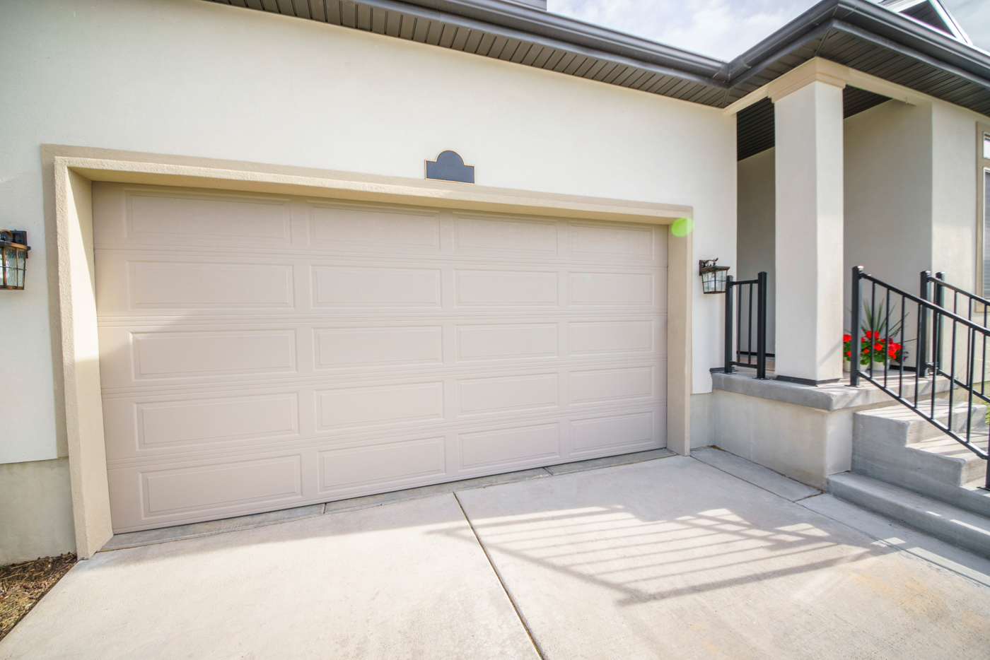 Double garage door on suburban Canadian home driveway