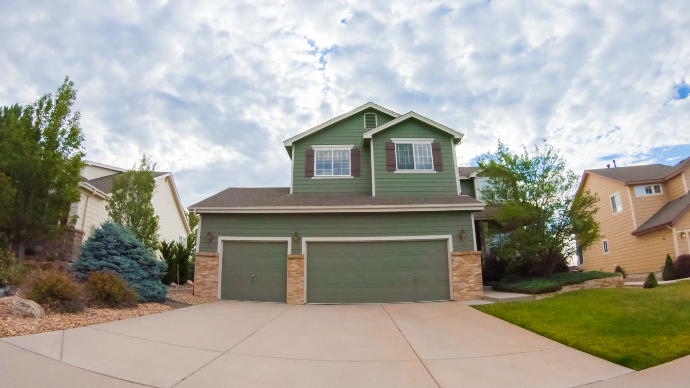 Modern double garage doors on Canadian home exterior
