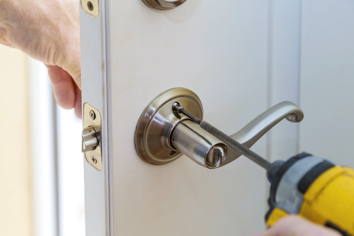 Lock installation on new home's front door