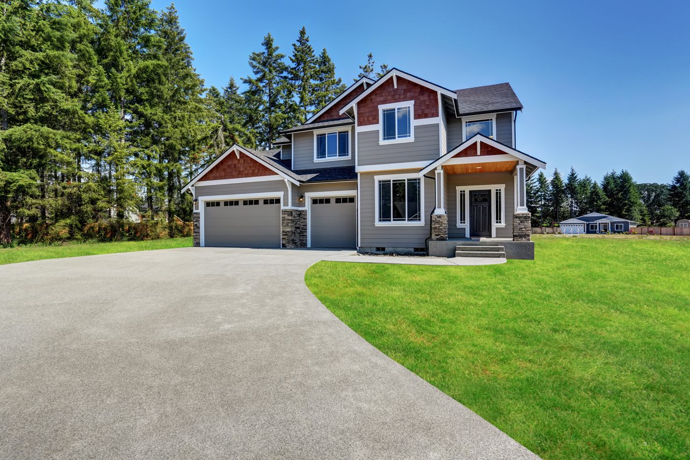 White garage doors on suburban Canadian home