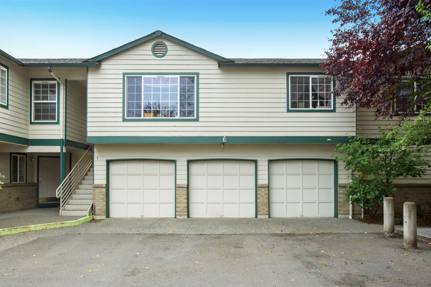 Three residential garage doors on Canadian home