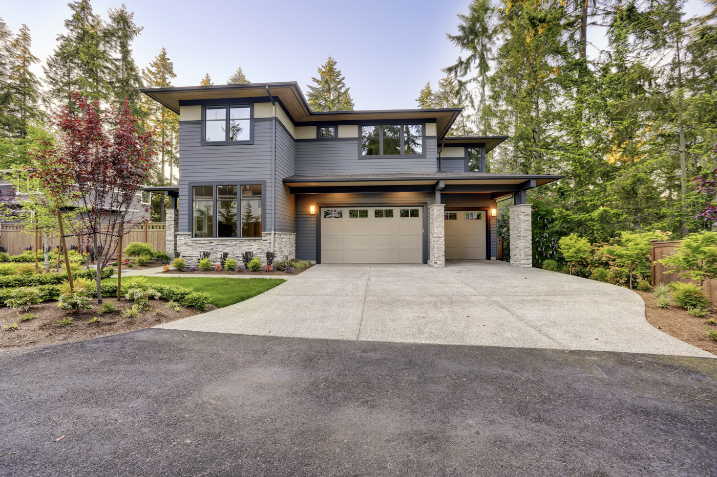 Modern residential garage door with window inserts