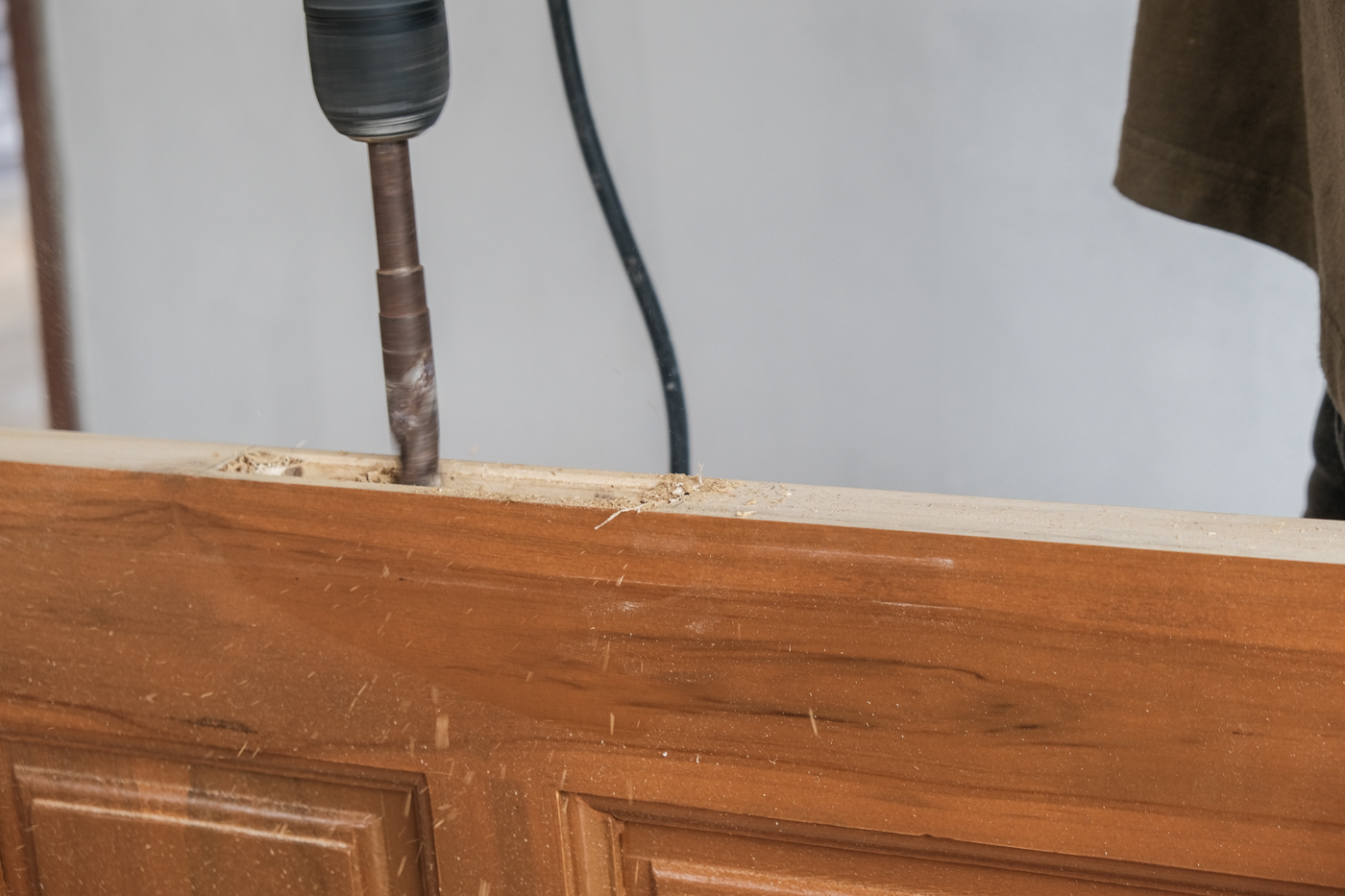 Barn door installation drilling wood panel