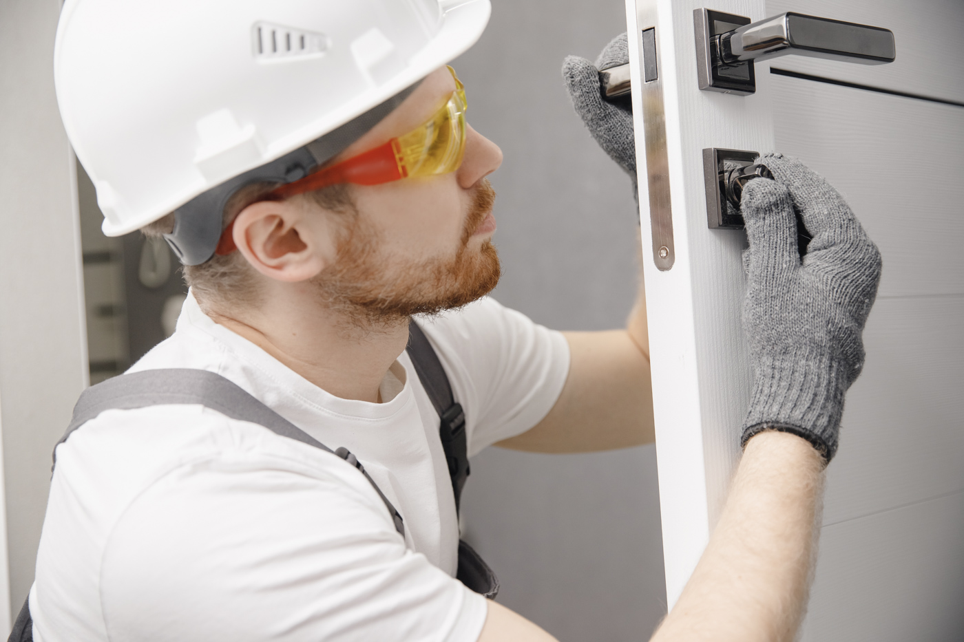 Locksmith installing electronic entry lock