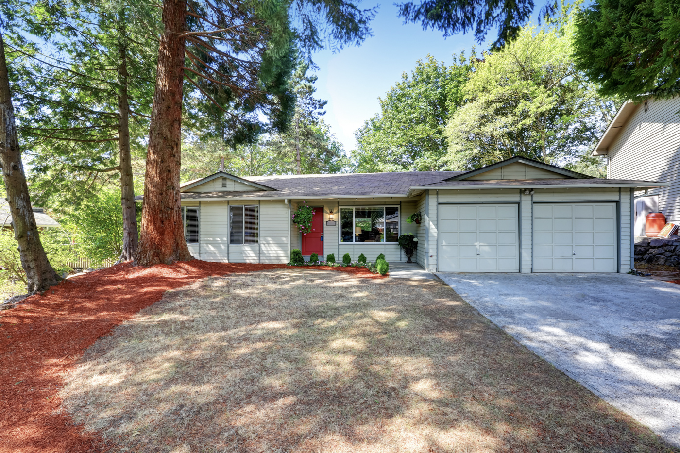 White two-car garage doors on Canadian home